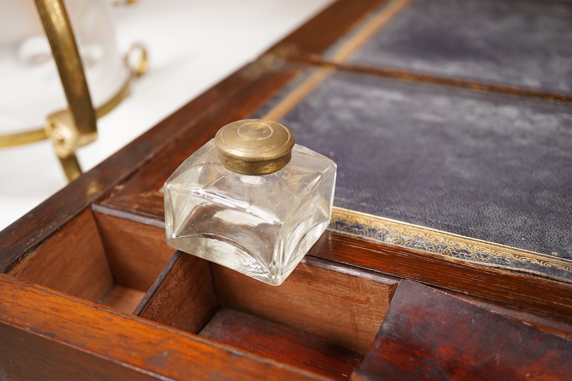 A Victorian walnut rising slope together with a rosewood writing slope